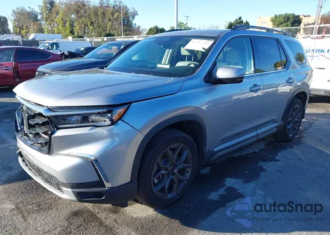 2024 Honda Pilot Touring z USA, uszkodzony, nr VIN 5FNYG2H77RB004203